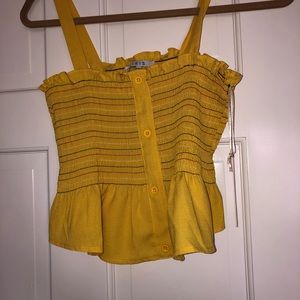 Cropped ruffled yellow tank top